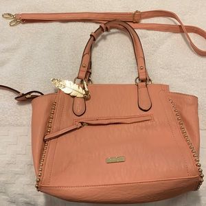 Jessica Simpson purse with two zippers compartments handles for over the shoulde